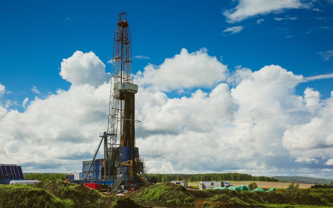 Land oil drilling rig blue sky